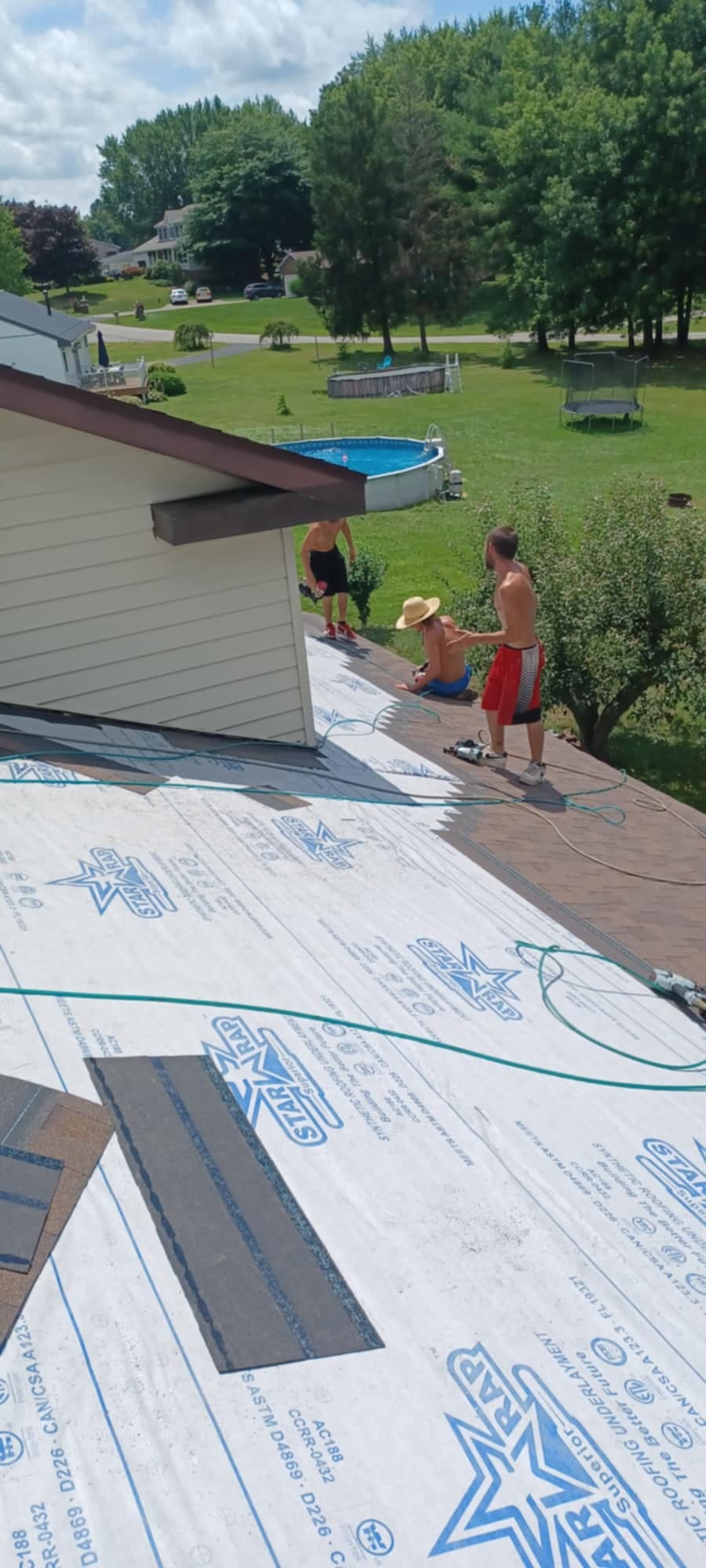 Working on a house roof